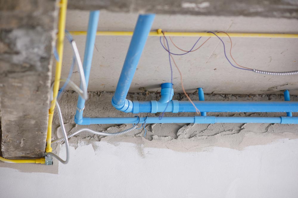 plumbing pipe near wiring