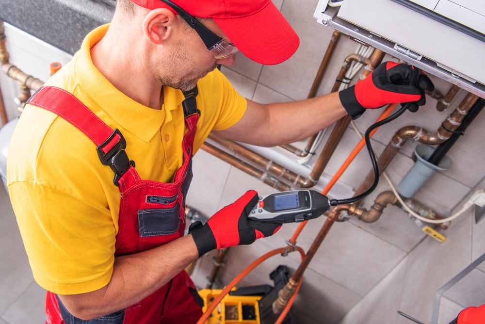 plumber using LeakTronics